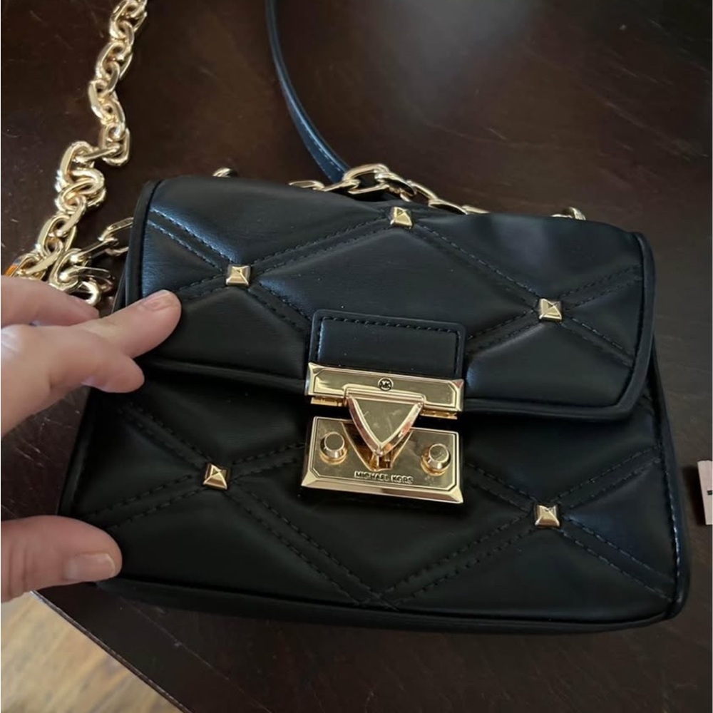 Black Quilted Leather Bag with Gold Accents